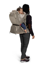 Osprey Poco LT Child Carrier in Tan Concrete, worn with a child, back view